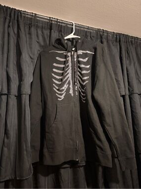 Black Zip-Up Hoodie with Rhinestone Ribcage Design
